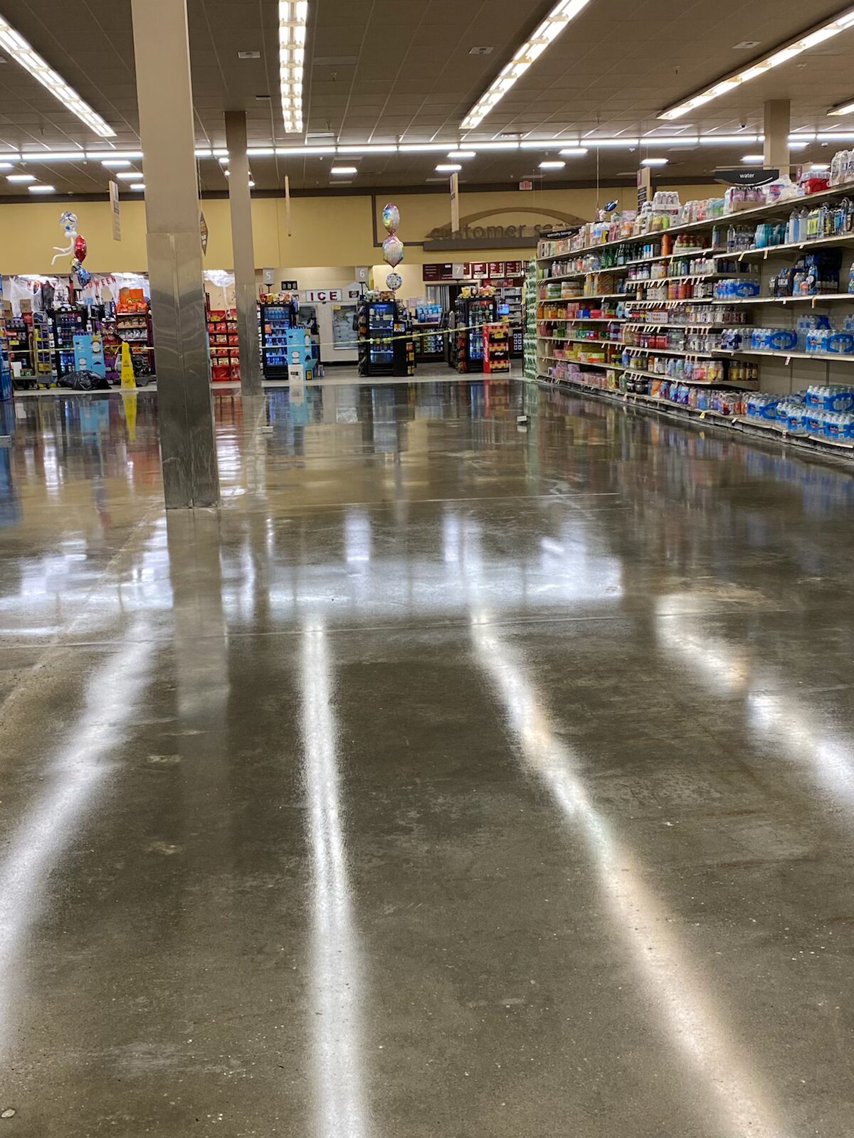Smooth polished concrete floor inside a commercial space in Henrico.